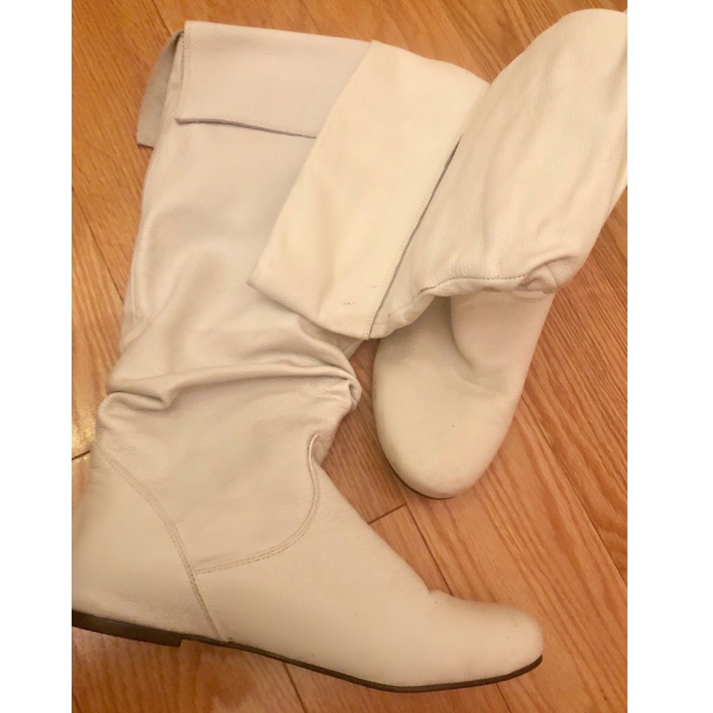 Woman’s white leather boots